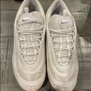 All white Nike 97